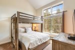 Guest bedroom upstairs offers a twin-over-queen bunk, or captain`s bunk